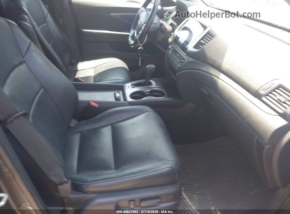 5FNYF6H57JB050224 2018 HONDA PILOT Black Front interior view