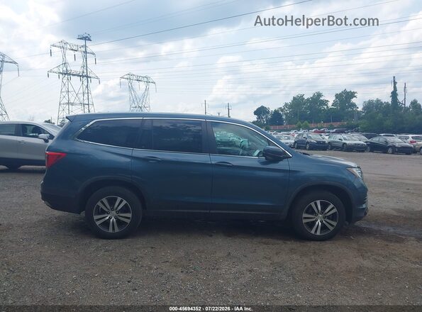 5FNYF6H58JB030399 2018 HONDA PILOT Синий Вид задней части салона