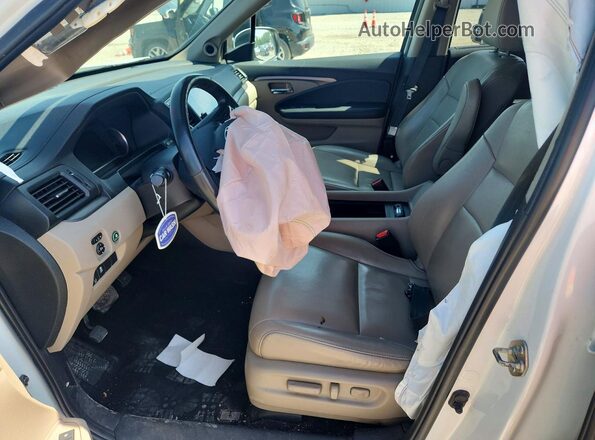 5FNYF6H58LB018546 2020 HONDA PILOT White Front interior view