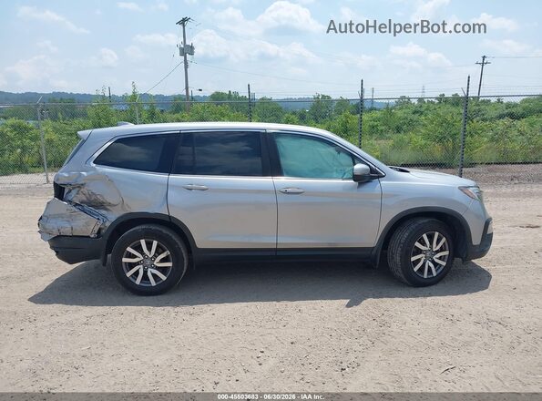 5FNYF6H5XKB035945 2019 HONDA PILOT Silver Vista interior trasera