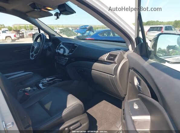 5FNYF6H60NB077909 2022 HONDA PILOT Белый Вид салона спереди