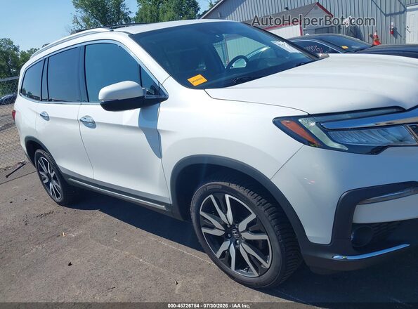 5FNYF6H60NB077909 2022 HONDA PILOT Белый Вид задней части салона