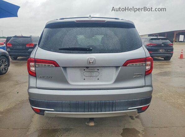 5FNYF6H61KB018007 2019 HONDA PILOT Silver Rear view