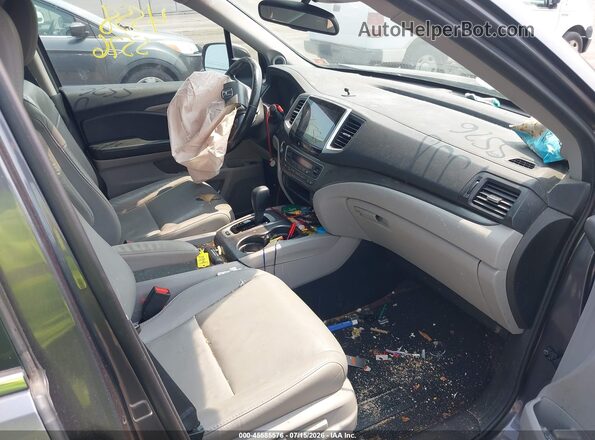 5FNYF6H66JB048702 2018 HONDA PILOT Серый Вид салона спереди
