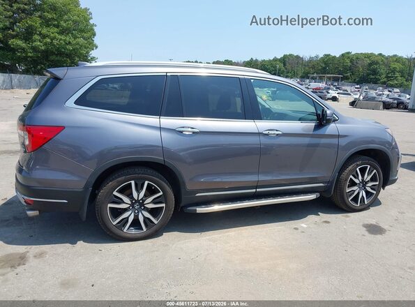 5FNYF6H68MB081768 2021 HONDA PILOT Gray Widok wnętrza z tyłu