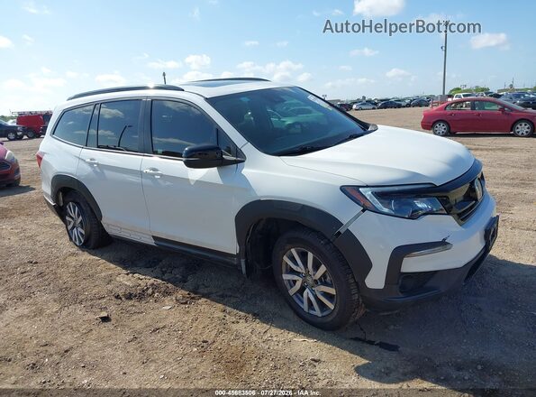 5FNYF6H82NB088766 2022 HONDA PILOT Белый Вид задней части салона