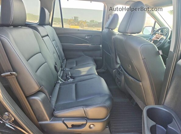 5FNYF6H89JB019812 2018 HONDA PILOT Black Rear seats view