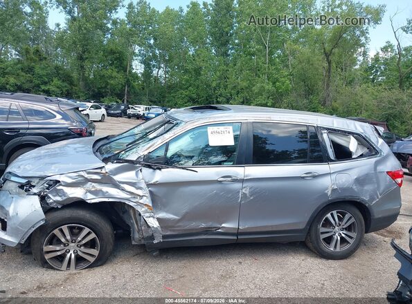5FNYF6H8XJB033346 2018 HONDA PILOT Gray Widok wnętrza z tyłu