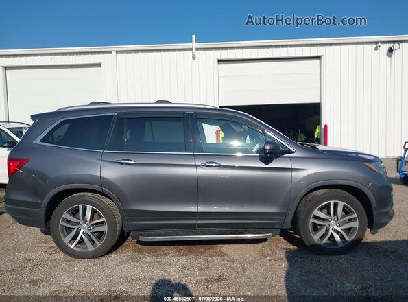 5FNYF6H90HB103391 2017 HONDA PILOT Gray Widok wnętrza z tyłu