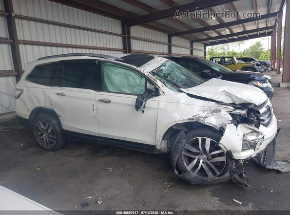 5FNYF6H91HB046523 2017 HONDA PILOT Белый Вид задней части салона