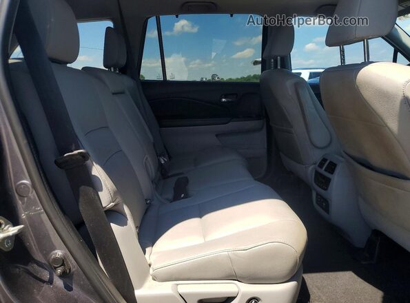 5FNYF6H92JB000057 2018 HONDA PILOT Gray Vista de los asientos traseros