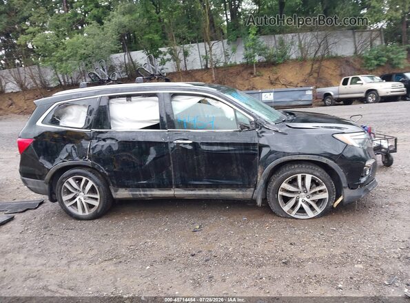 5FNYF6H96HB003120 2017 HONDA PILOT Black Вид задньої частини салону