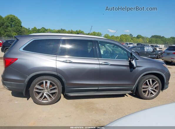 5FNYF6H97GB040966 2016 HONDA PILOT Gray Widok wnętrza z tyłu