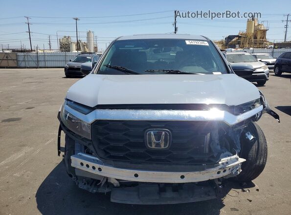 5FNYF7H50NB004956 2022 HONDA PASSPORT Gray Front view