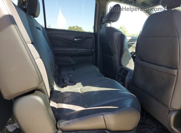 5FNYF7H51KB001205 2019 HONDA PASSPORT White Rear interior view