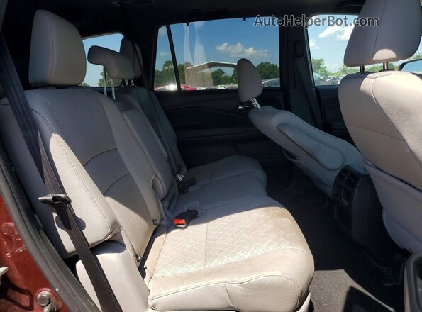 5FNYF7H52MB000163 2021 HONDA PASSPORT Burgundy Rear interior view