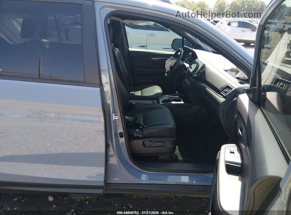 5FNYF7H55NB003799 2022 HONDA PASSPORT Light Blue Widok wnętrza z przodu
