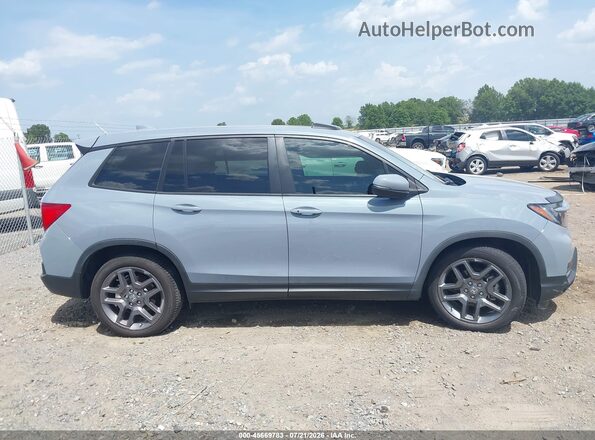 5FNYF7H55NB003799 2022 HONDA PASSPORT Light Blue Widok wnętrza 360 stopni