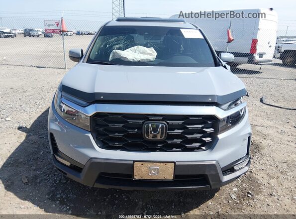 5FNYF7H55NB003799 2022 HONDA PASSPORT Light Blue Widok wnętrza z tyłu