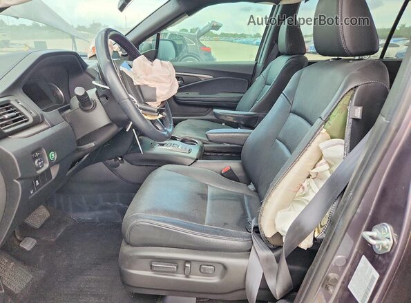 5FNYF7H5XMB016059 2021 HONDA PASSPORT Gray Vista interior delantera