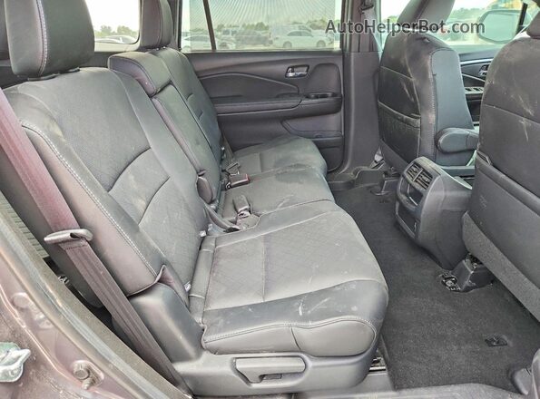 5FNYF7H5XMB016059 2021 HONDA PASSPORT Gray Vista interior trasera