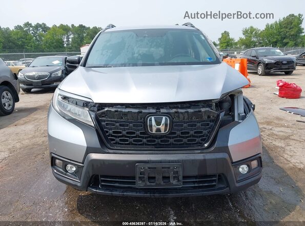 5FNYF7H96MB001951 2021 HONDA PASSPORT Silver Vista interior trasera