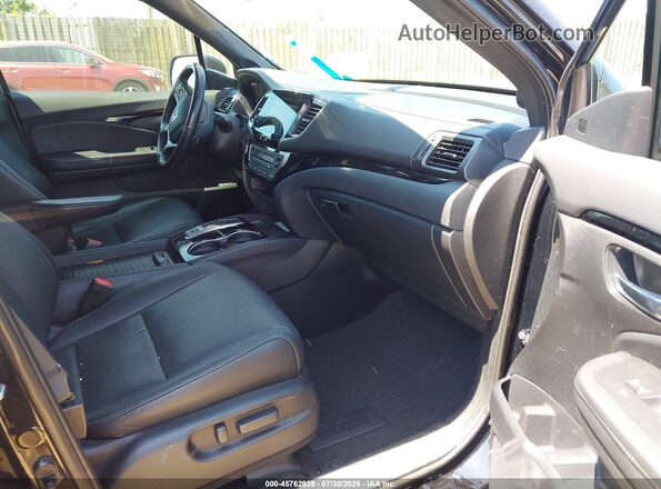 5FNYF8H02LB003718 2020 HONDA PASSPORT Black Front interior view