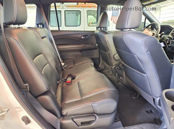 5FNYF8H03MB007651 2021 HONDA PASSPORT White Vista interior trasera