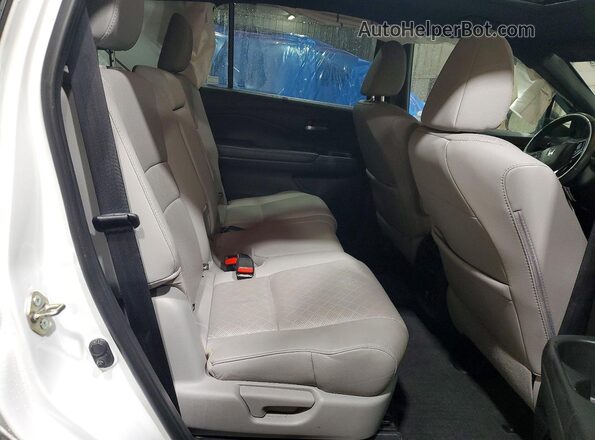 5FNYF8H04LB007799 2020 HONDA PASSPORT White Rear interior view
