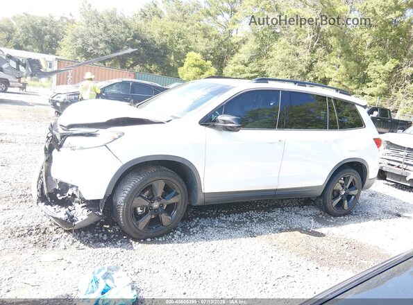 5FNYF8H04MB017721 2021 HONDA PASSPORT Белый Вид задней части салона