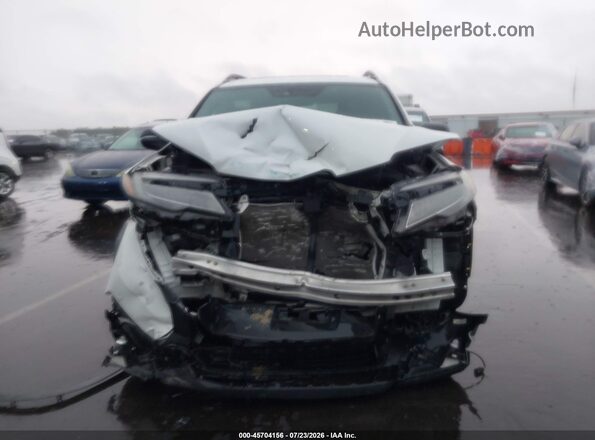 5FNYF8H05MB007215 2021 HONDA PASSPORT White Widok wnętrza z tyłu