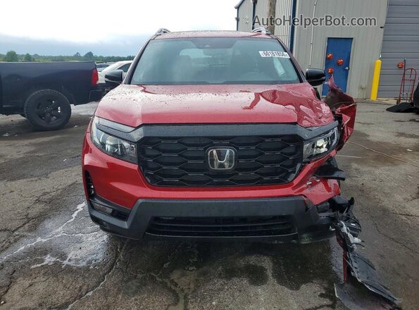 5FNYF8H05PB012726 2023 HONDA PASSPORT Burgundy Front view