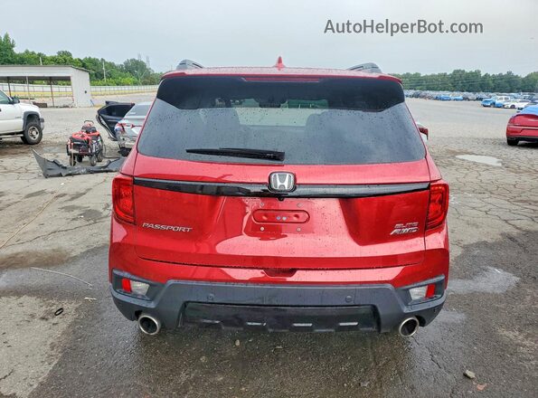 5FNYF8H05PB012726 2023 HONDA PASSPORT Burgundy Rear view