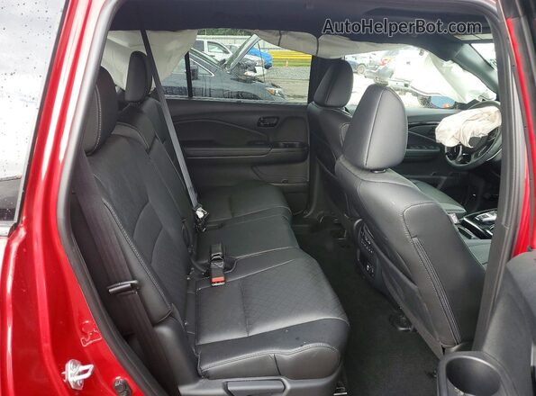 5FNYF8H05PB012726 2023 HONDA PASSPORT Burgundy Rear seats view