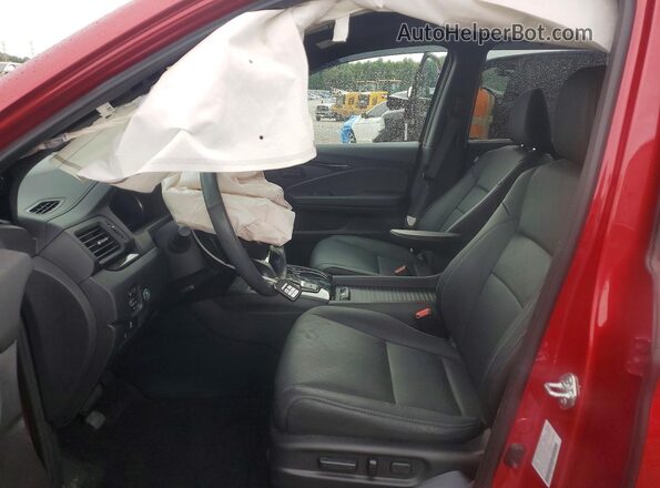 5FNYF8H05PB012726 2023 HONDA PASSPORT Burgundy Front interior view