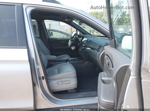 5FNYF8H06PB030393 2023 HONDA PASSPORT Gray Widok wnętrza z przodu