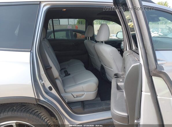 5FNYF8H06PB030393 2023 HONDA PASSPORT Gray Widok naklejki z numerem VIN