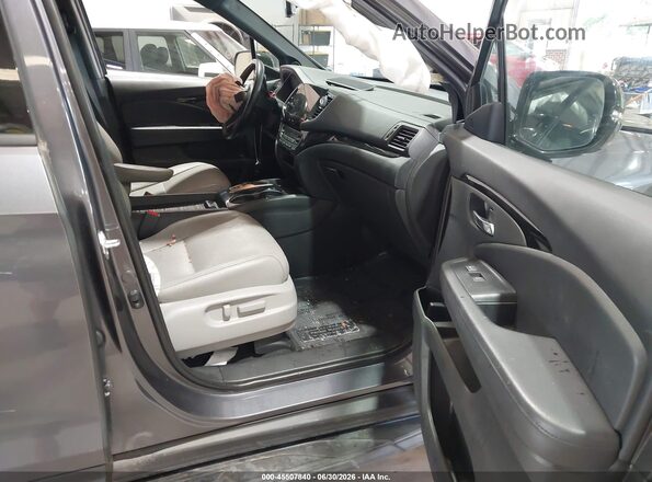 5FNYF8H08MB019987 2021 HONDA PASSPORT Black Vista interior delantera