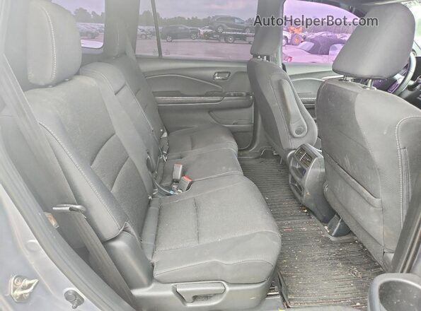 5FNYF8H20KB019724 2019 HONDA PASSPORT Silver Rear interior view