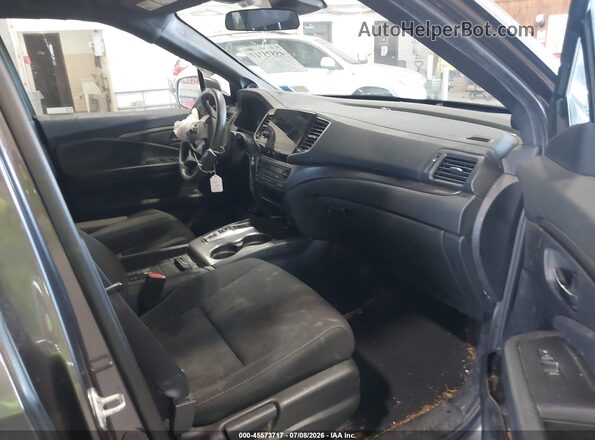 5FNYF8H20MB024487 2021 HONDA PASSPORT Gray Front interior view