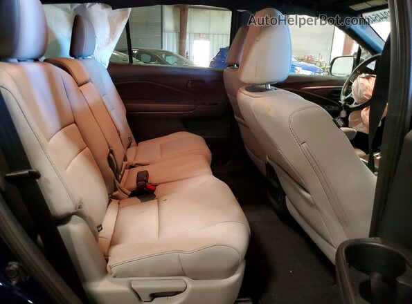 5FNYF8H50PB004920 2023 HONDA PASSPORT Синий Вид задней части салона