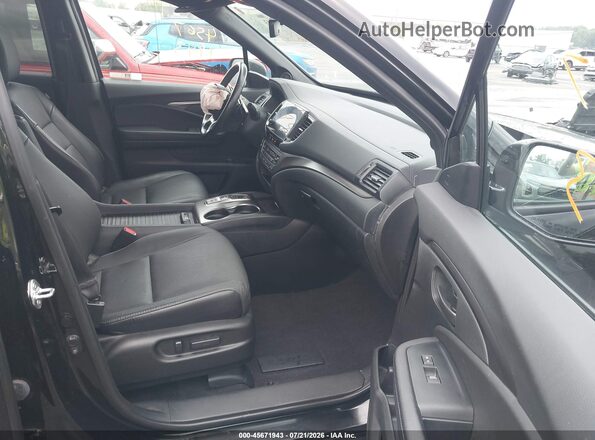 5FNYF8H54PB005696 2023 HONDA PASSPORT Black Widok wnętrza z przodu