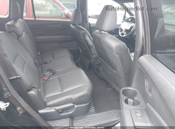 5FNYF8H54PB005696 2023 HONDA PASSPORT Black Widok naklejki z numerem VIN