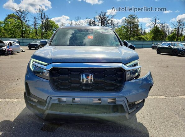 5FNYF8H55PB005819 2023 HONDA PASSPORT Gray Вид спереду
