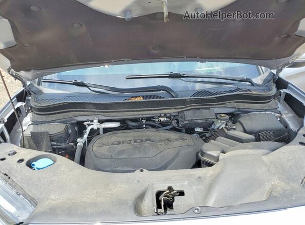 5FNYF8H55PB034950 2023 HONDA PASSPORT Silver Widok wnętrza z tyłu