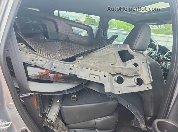 5FNYF8H56MB008059 2021 HONDA PASSPORT Серебряный Вид задней части салона