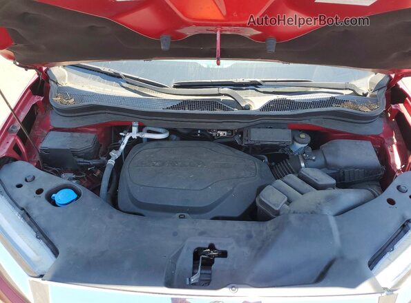 5FNYF8H57PB005398 2023 HONDA PASSPORT Burgundy Vista del compartimento del motor