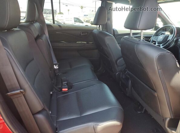 5FNYF8H57PB005398 2023 HONDA PASSPORT Burgundy Vista interior trasera