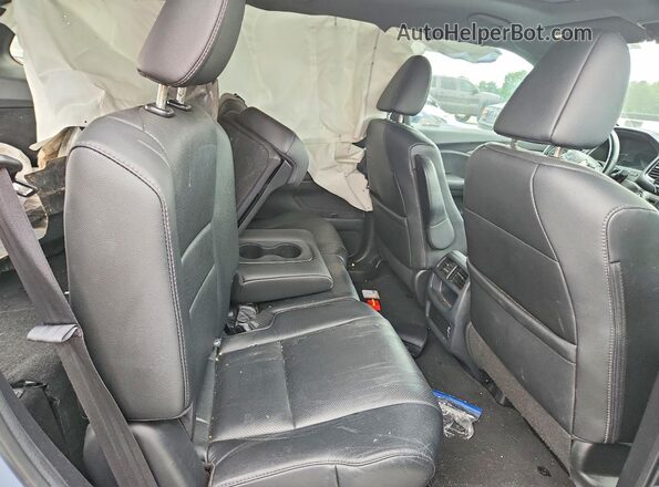 5FNYF8H57PB019253 2023 HONDA PASSPORT Blue Սալոնի հետևի տեսք