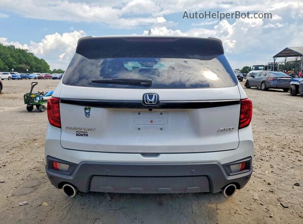 5FNYF8H57RB018459 2024 HONDA PASSPORT White Rear view